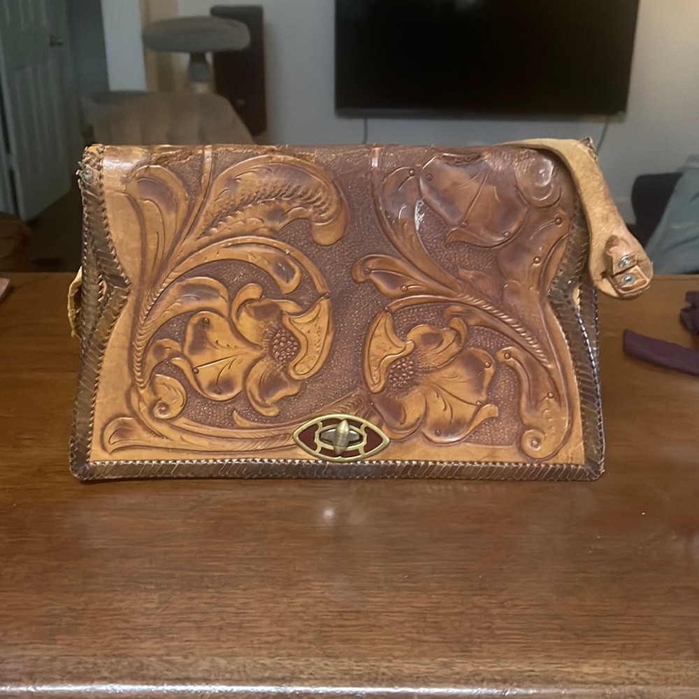 Vintage tooled leather purse.